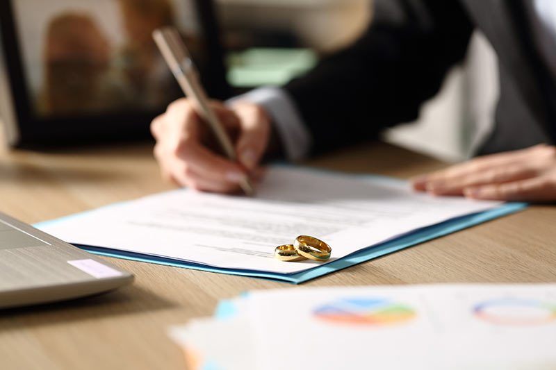 business woman signing document